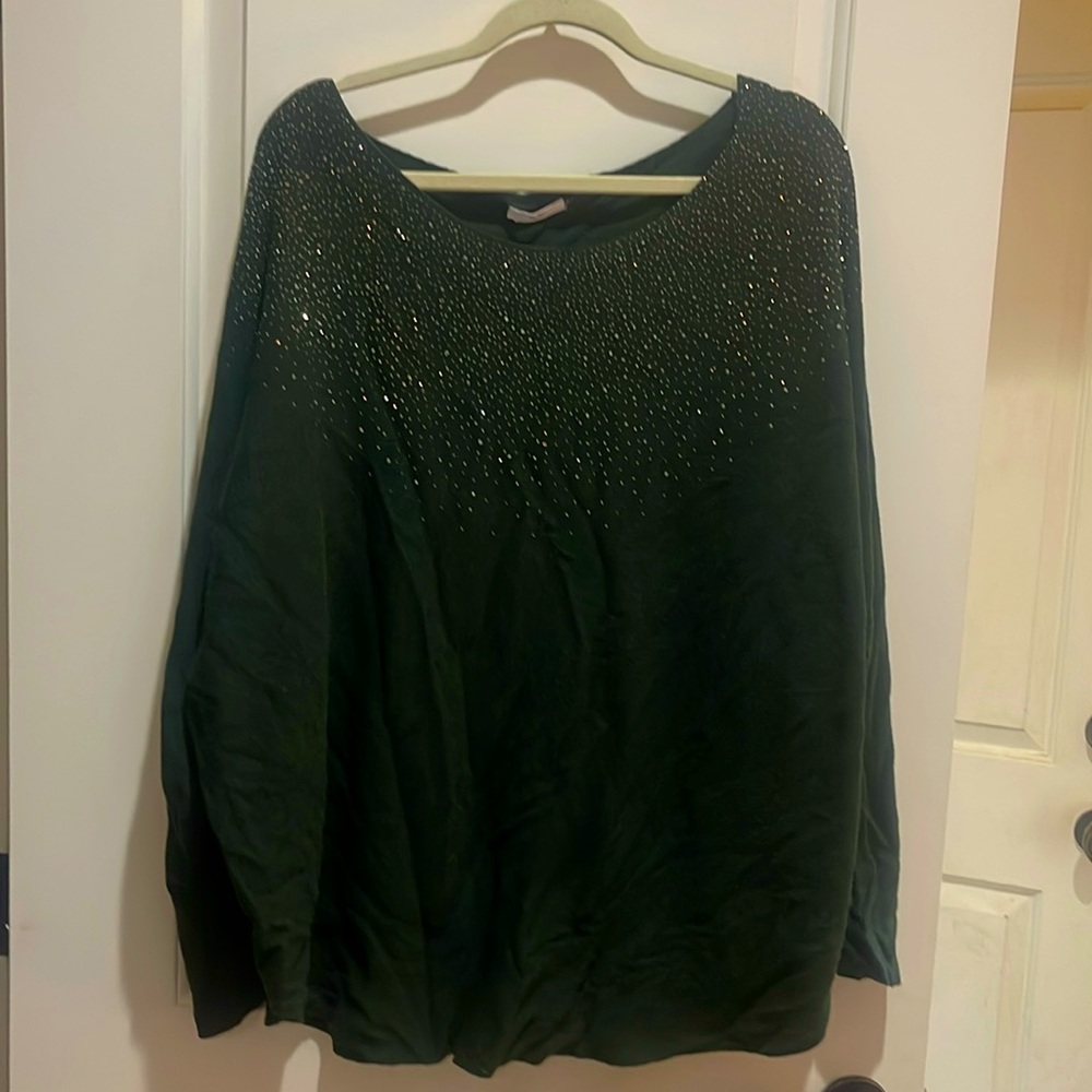 Green sweater with rhinestones